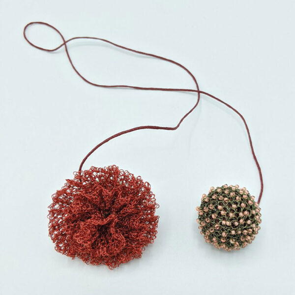 Lariat, red beaded flower, burgundy string
Enamel copper wire, beads, string